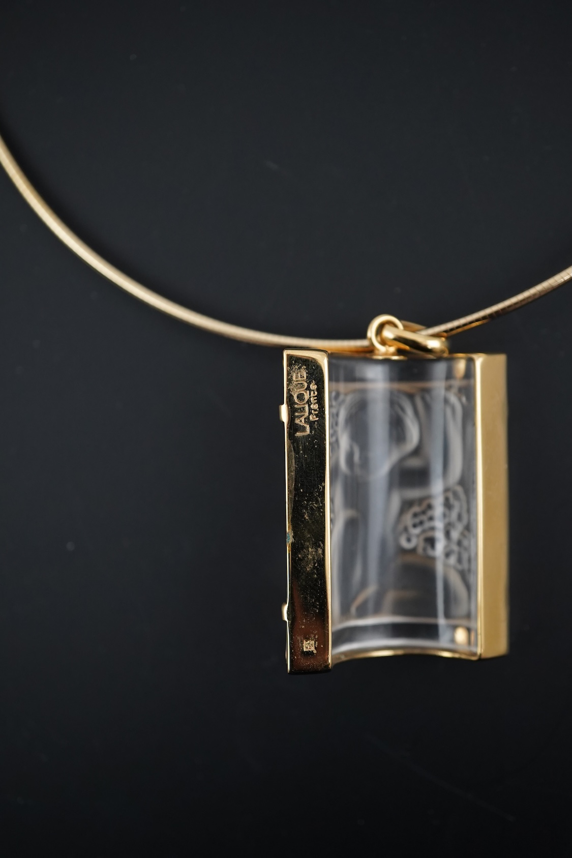 A Lalique Enfants pendant necklace, cased